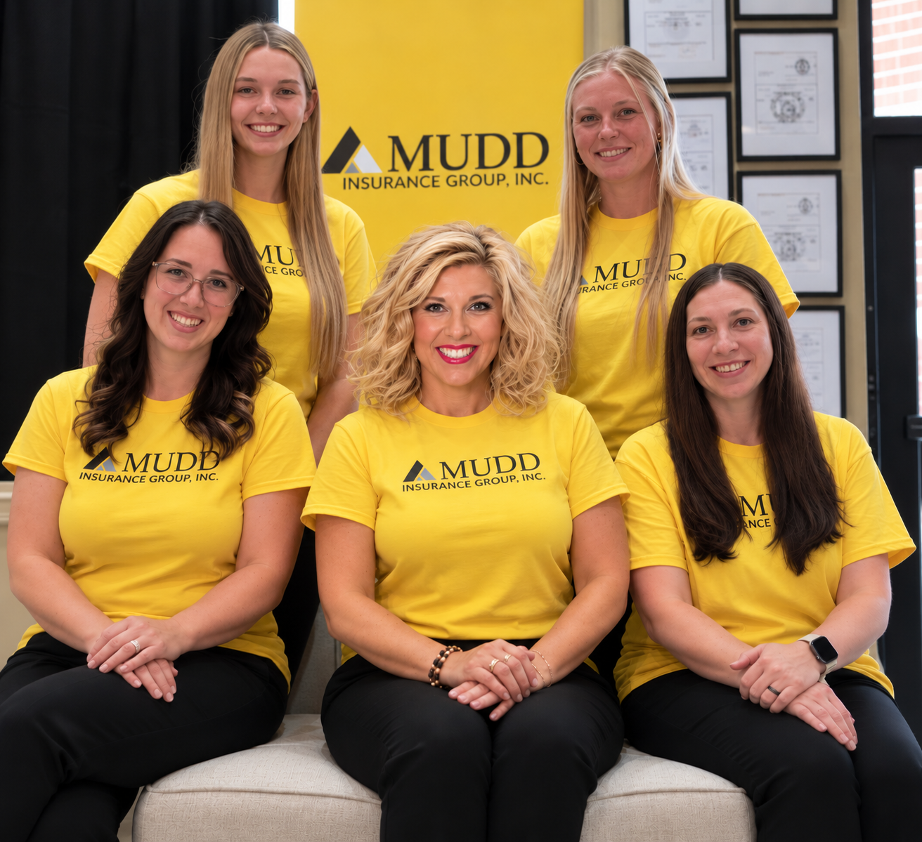 The five members of the Mudd Insurance Group team